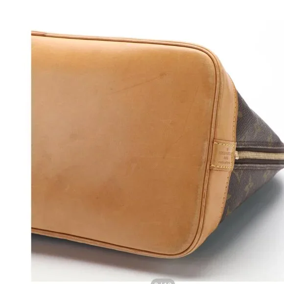 Louis Vuitton Alma PM Monogram Canvas and Leather Handbag - Picture 8 of 11